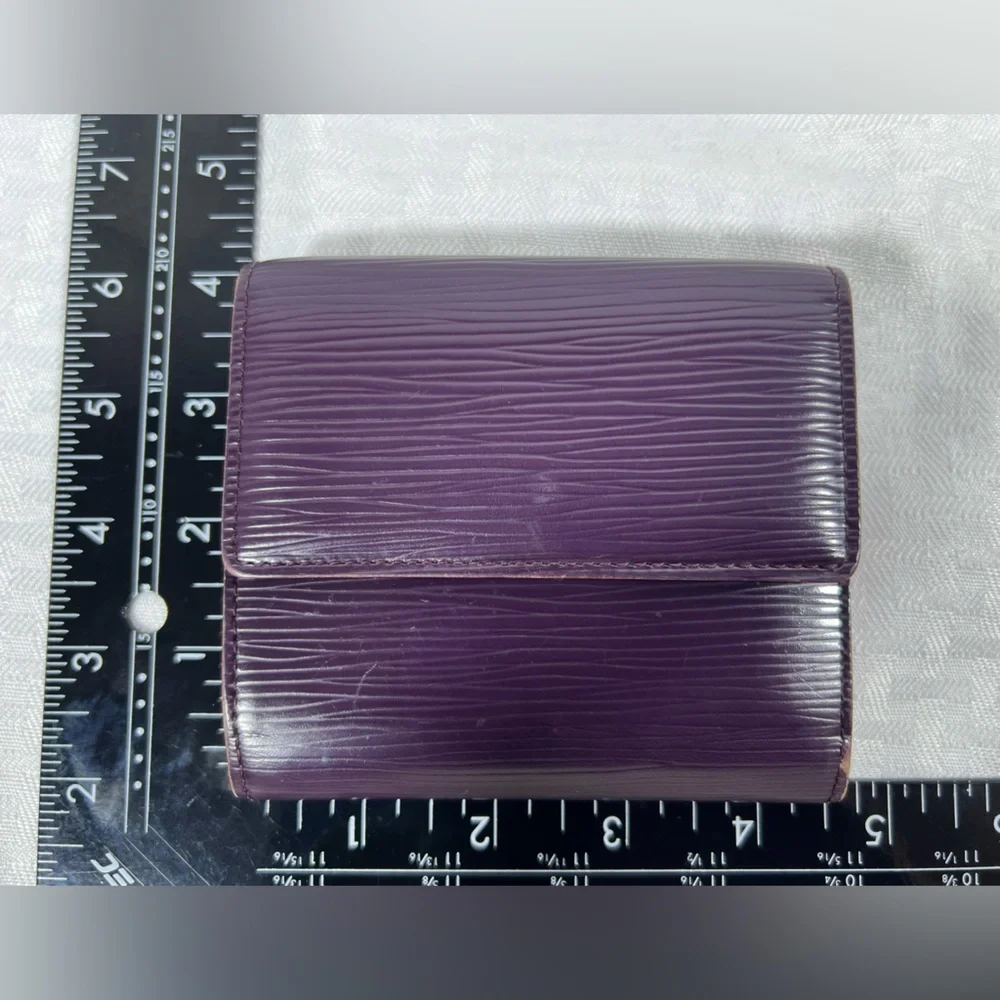 1136: Louis Vuitton Epi Leather Trifold Wallet Purple